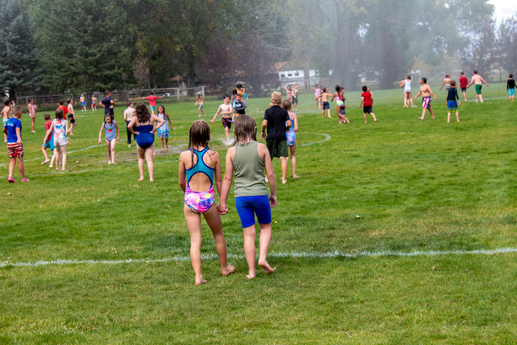 Students playing in water