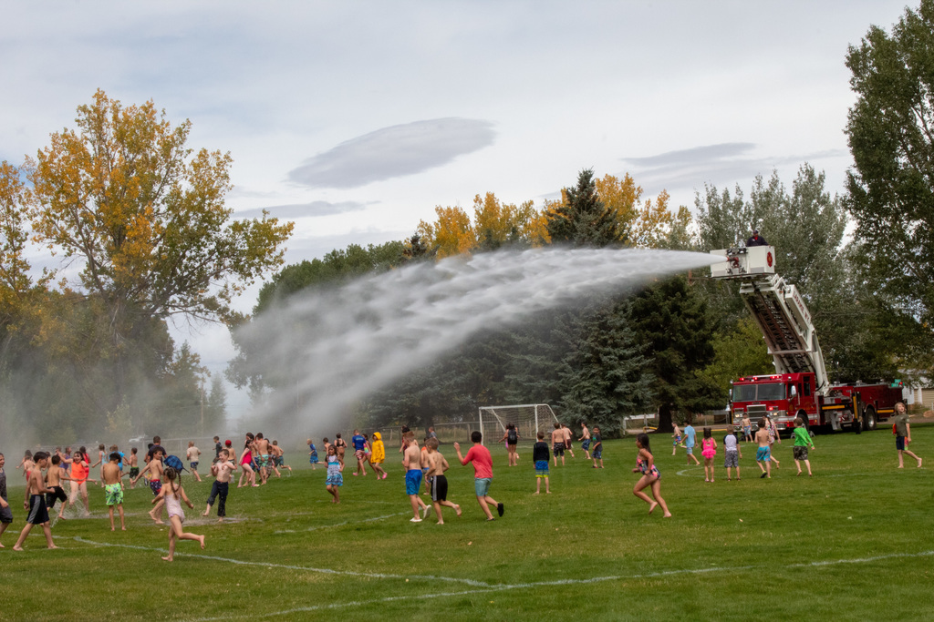Students playing in water
