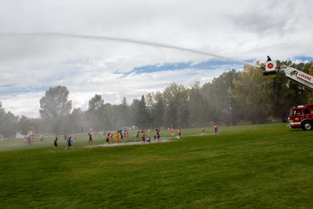 Students playing in water