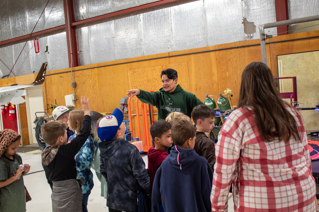Students learning from UW professors and students 