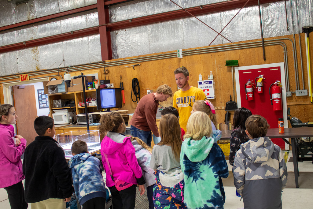 Students learning from UW professors and students 