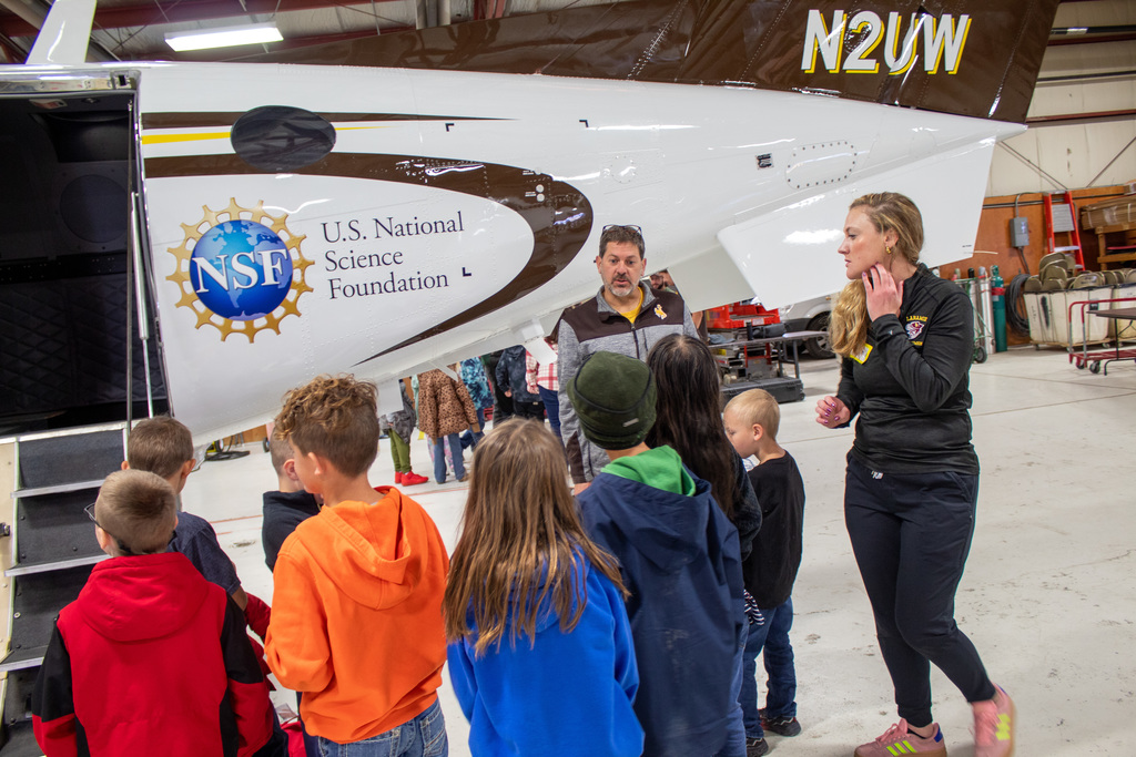 Students learning from UW professors and students 