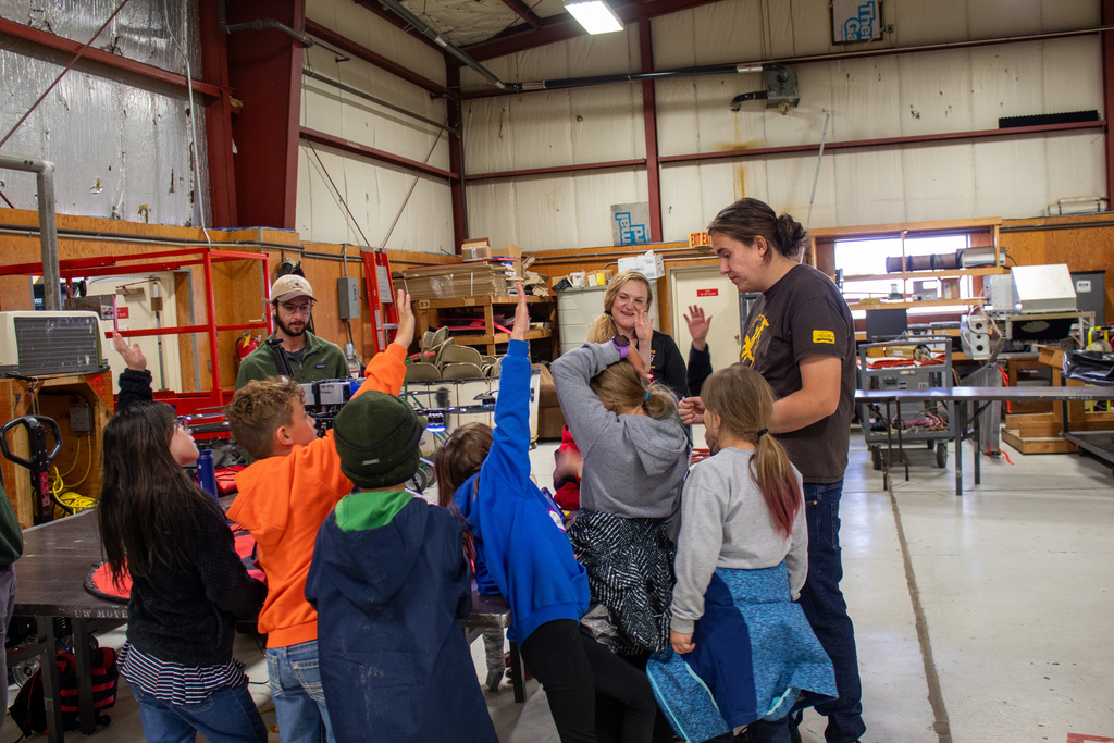 Students learning from UW professors and students 