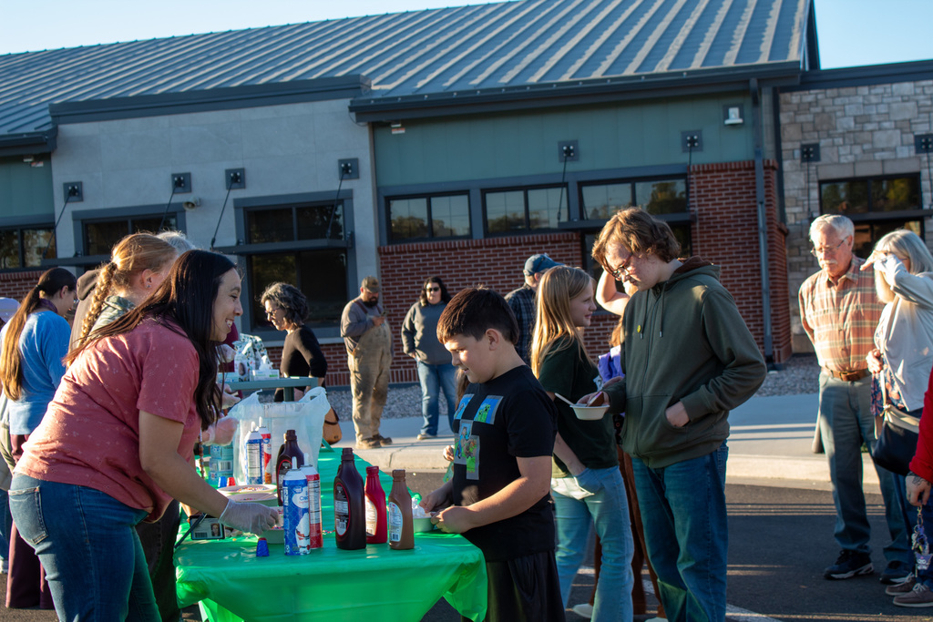 Students lined up to be served ice ream