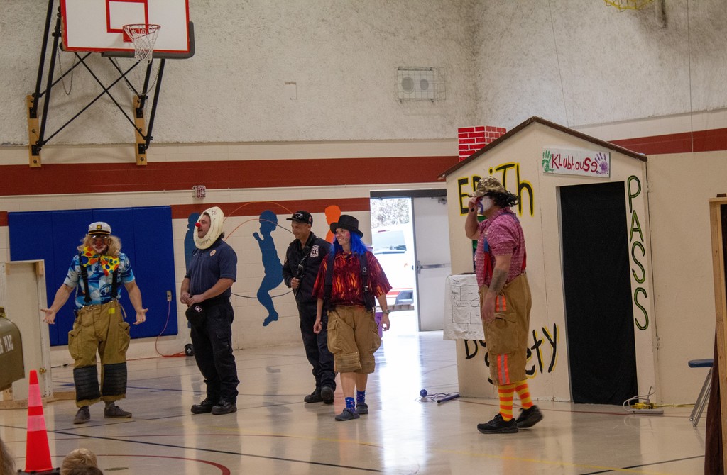 Fire Clowns talking to students