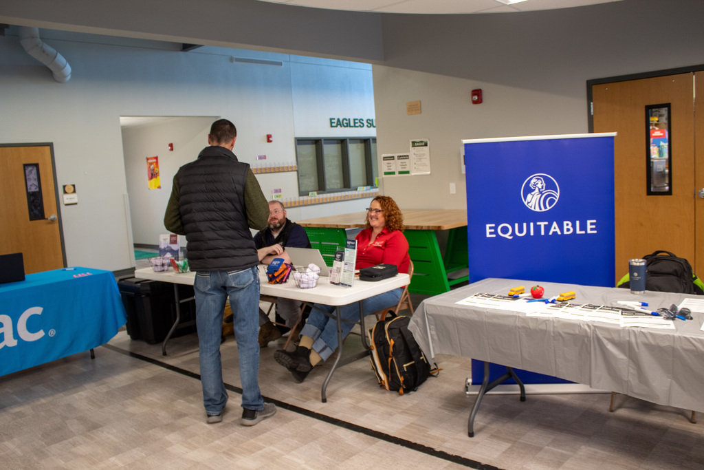 staff speaking to representative