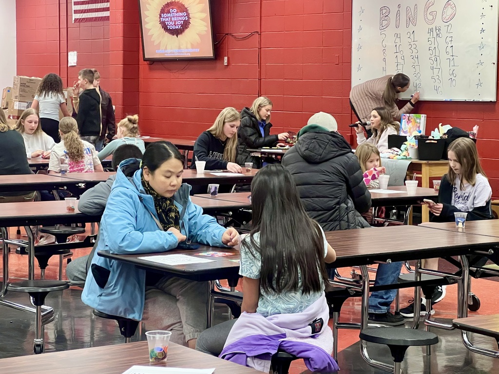 Students and families playing Bingo