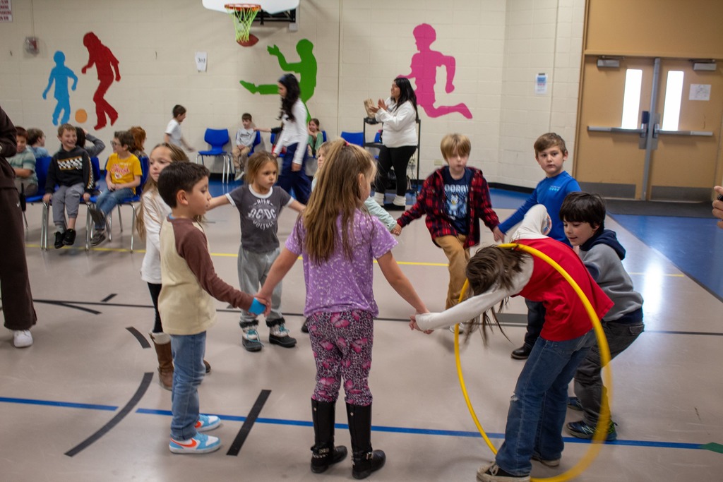 Students playing games in the gym