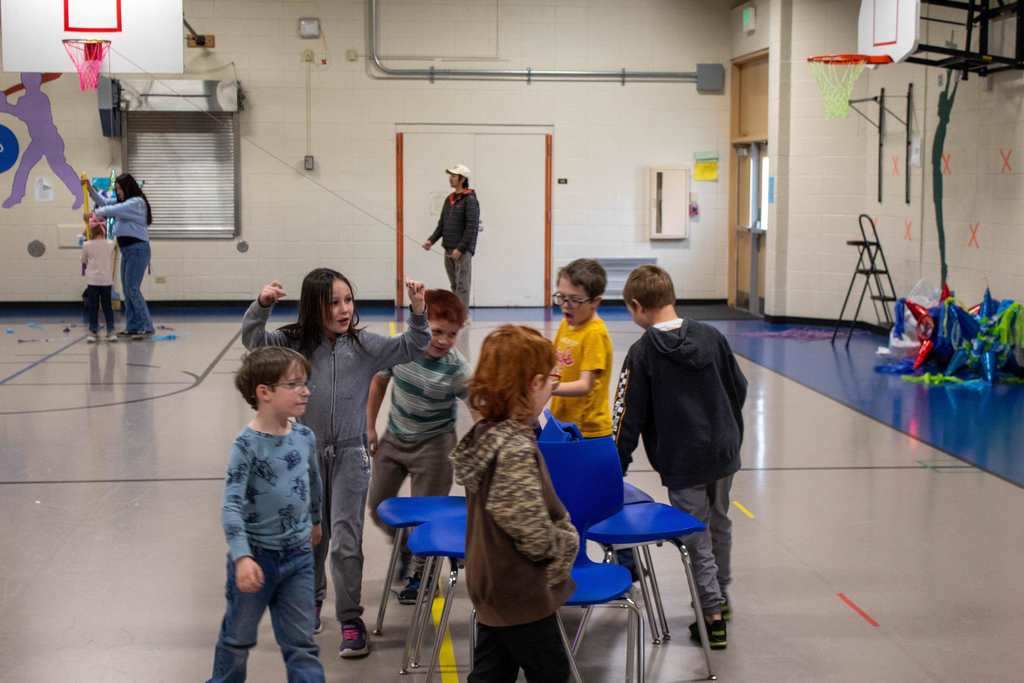 Students playing musical chairs