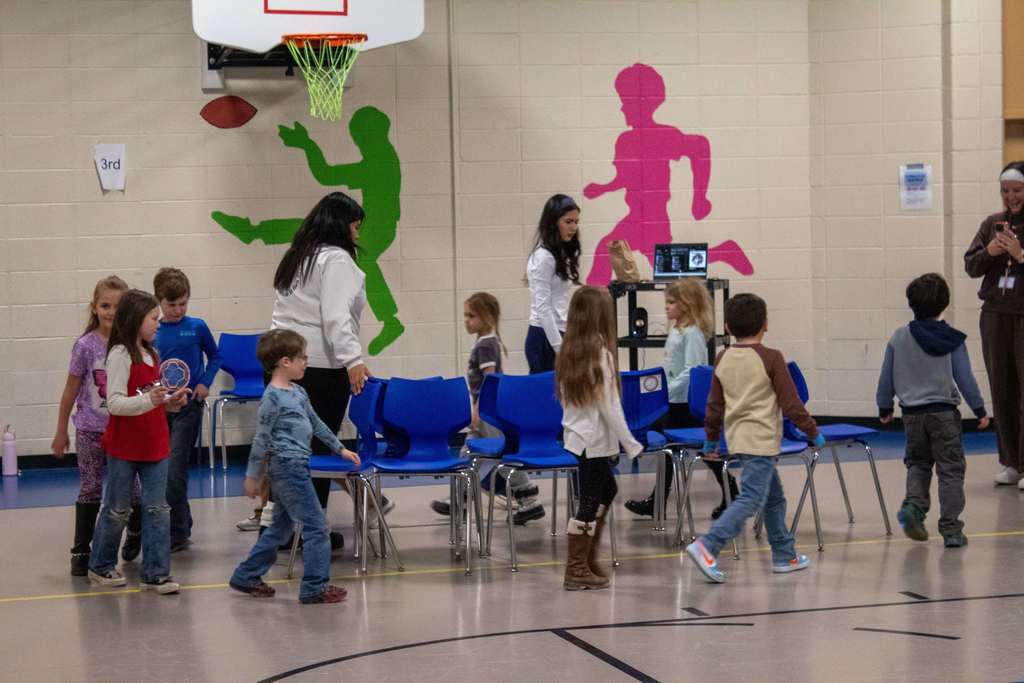 Students playing musical chairs