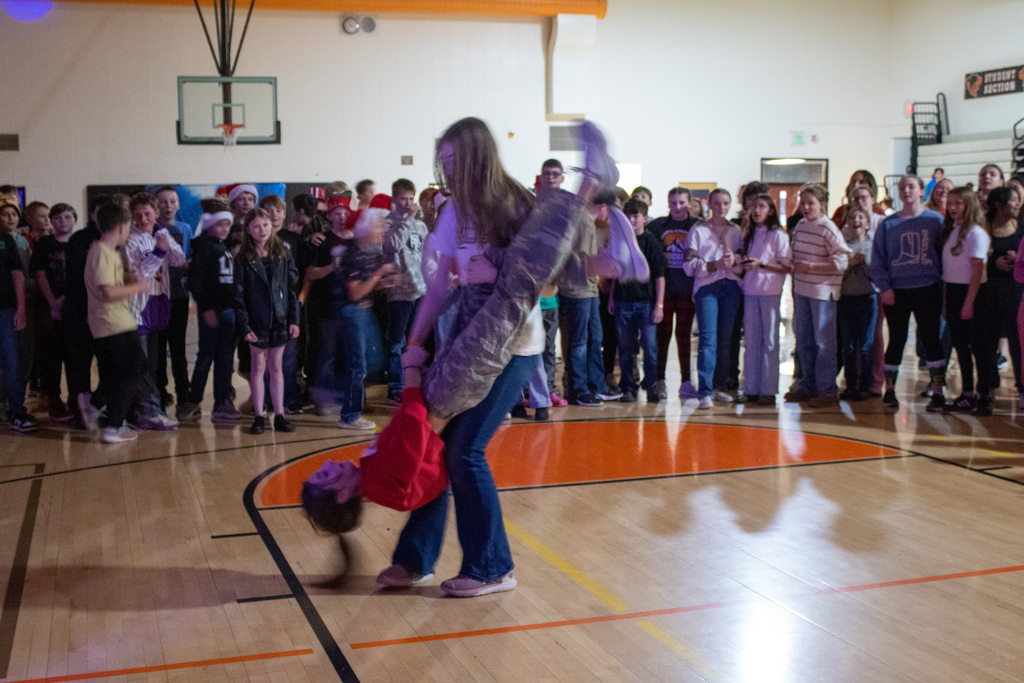 Middle School students dancing in the gym