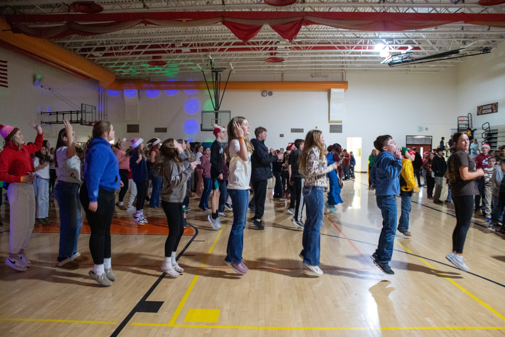 Middle School students dancing in the gym