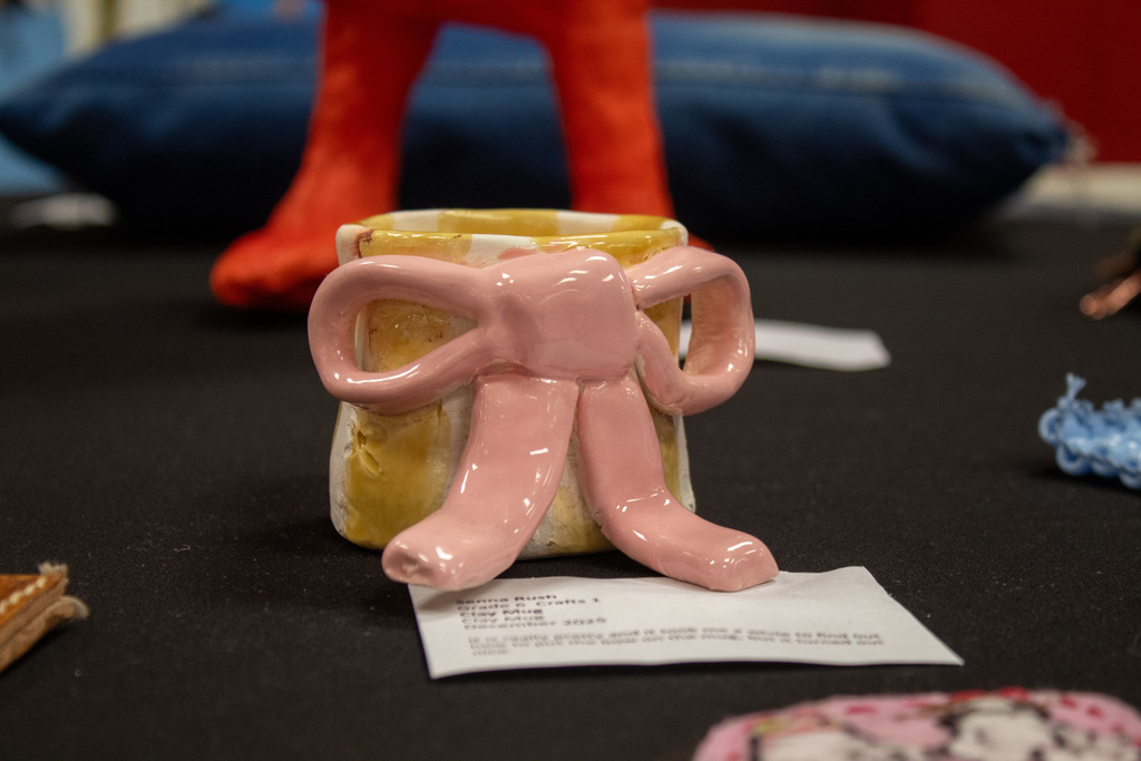 yellow coffee cup with a bow