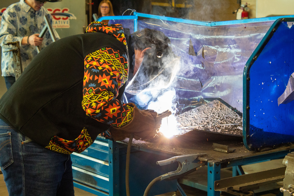 student working in the shop