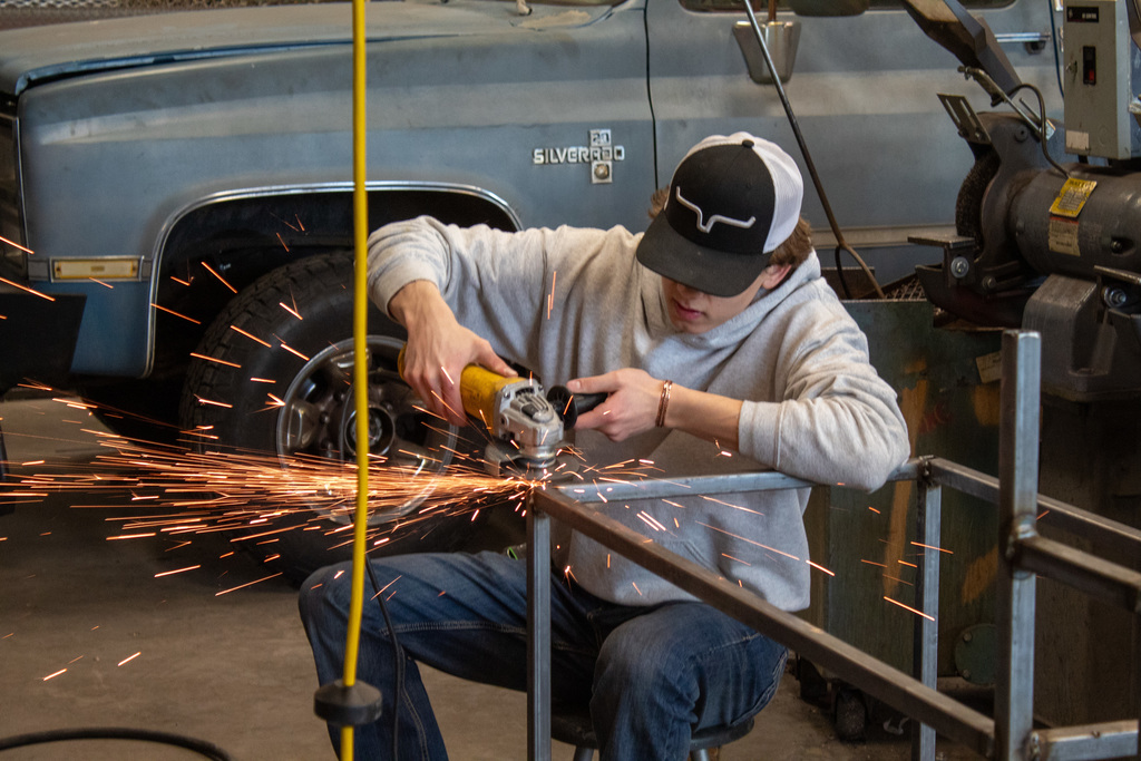 student working in the shop