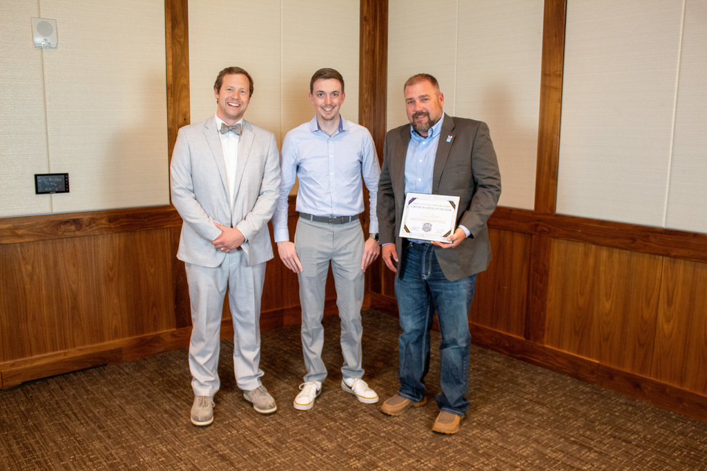 Three men dressed in business clothes