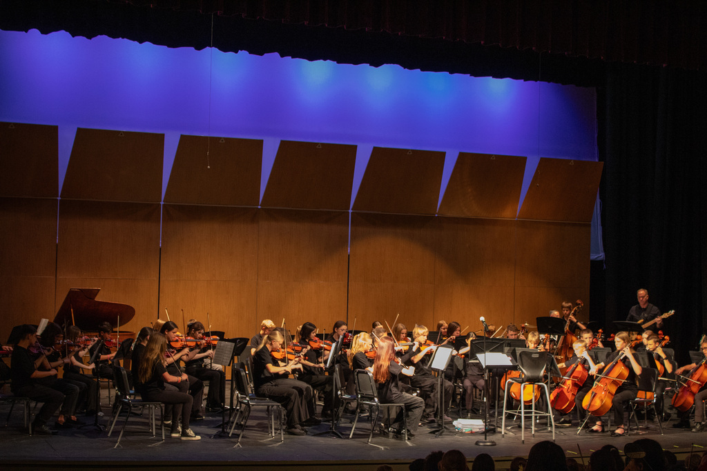 Middle School Orchestra performing on stage