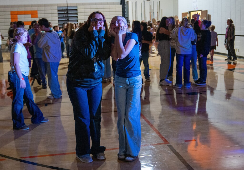Two girls posing for a picture