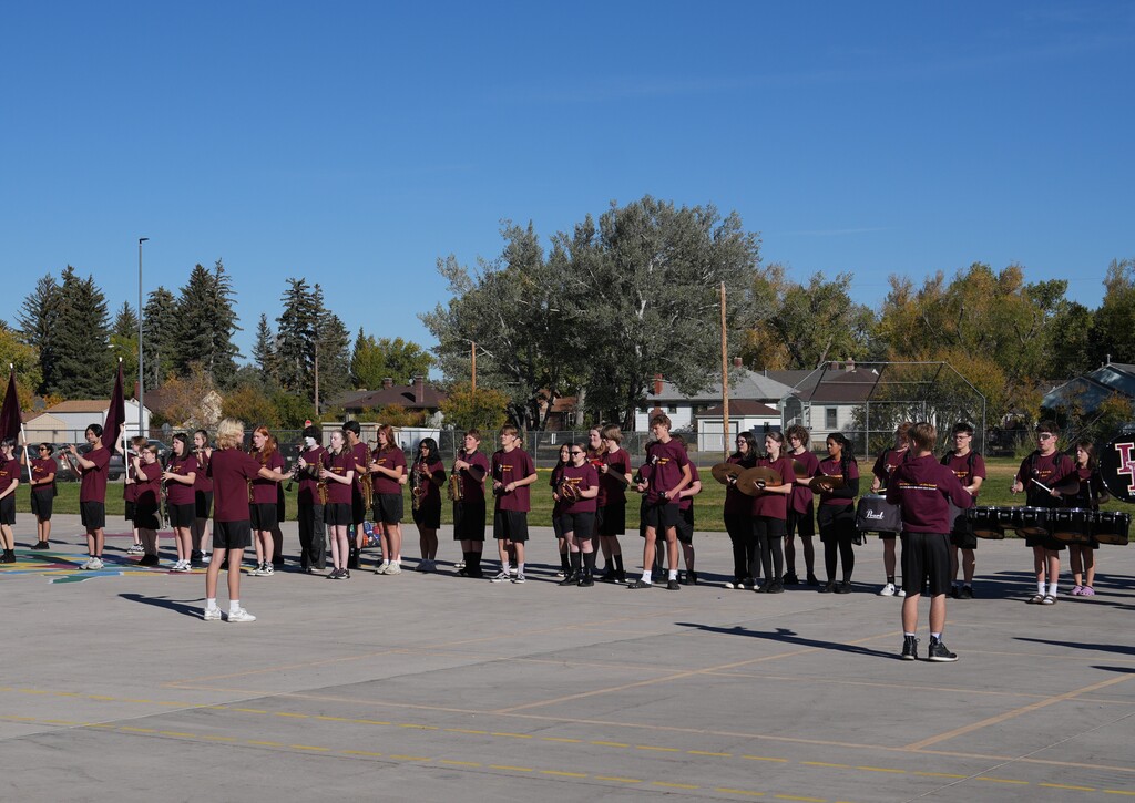 Band members lined up to play for a crowd