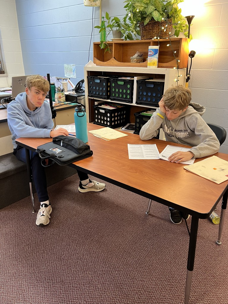 Students working together to find key information.