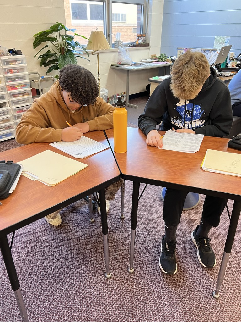 Students working together to find key information.