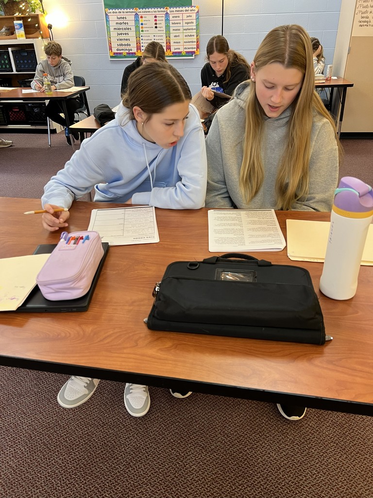 Students working together to find key information.