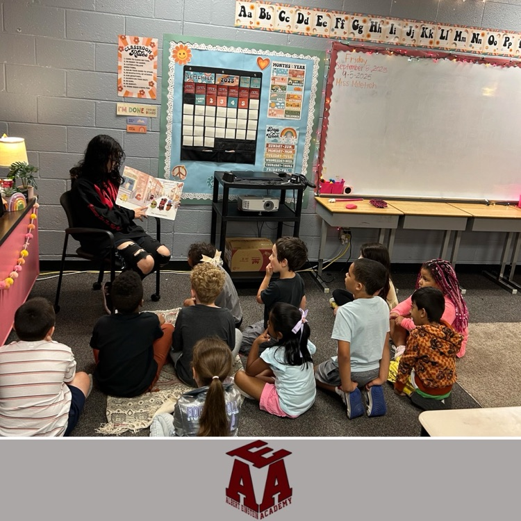 senior reading to 1st graders