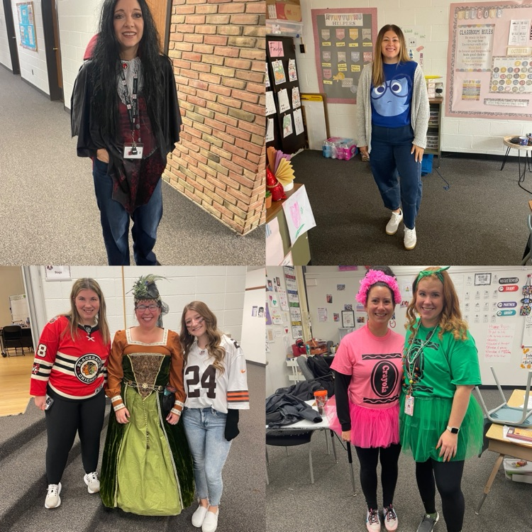 students and staff in Halloween costumes