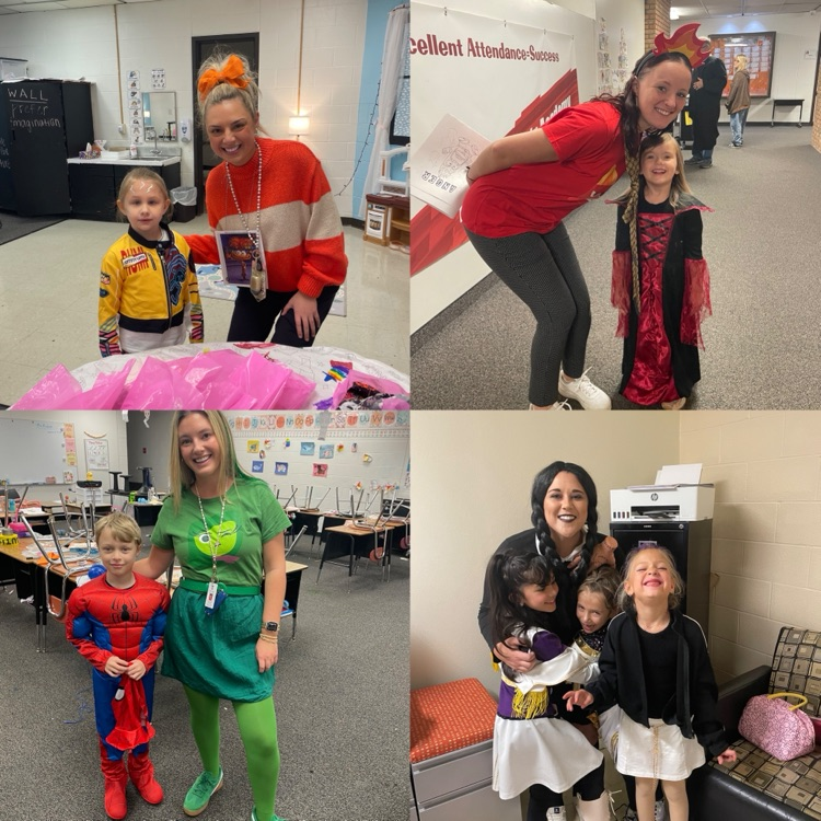 students and staff in Halloween costumes