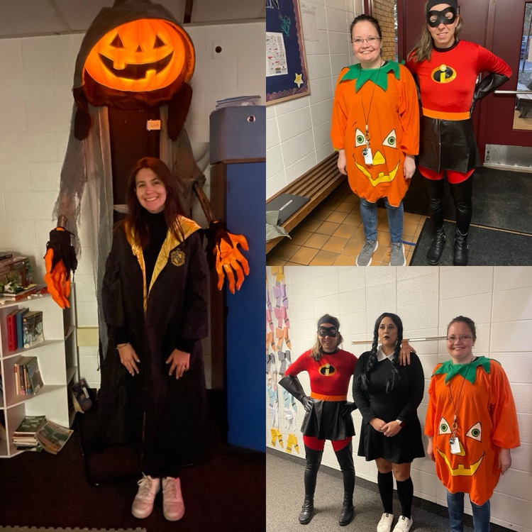 students and staff in Halloween costumes