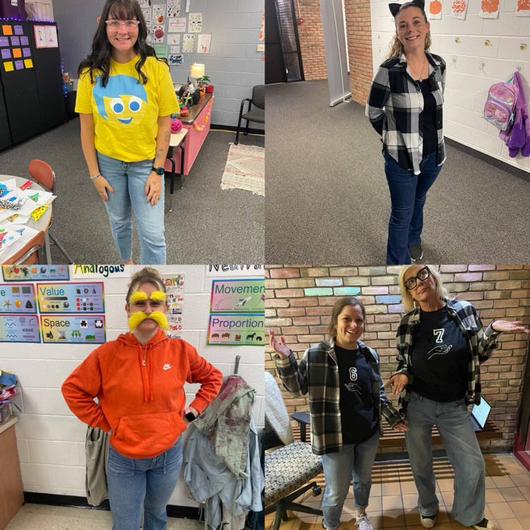 students and staff in Halloween costumes
