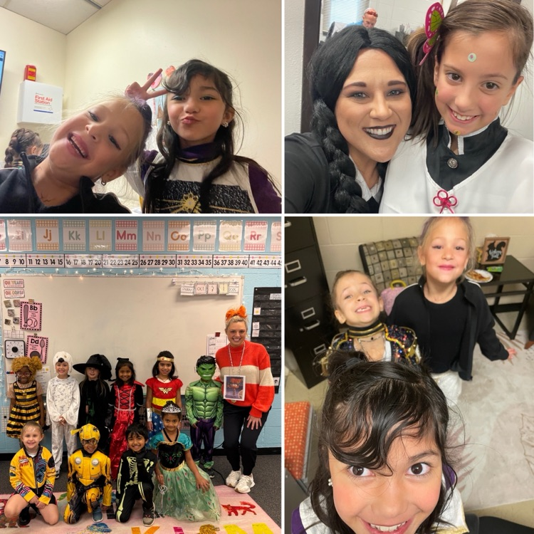 students and staff in Halloween costumes