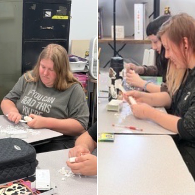 students making soapstone tools