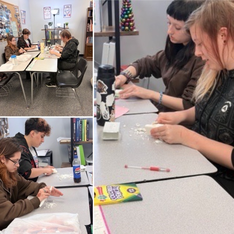 students making soapstone tools