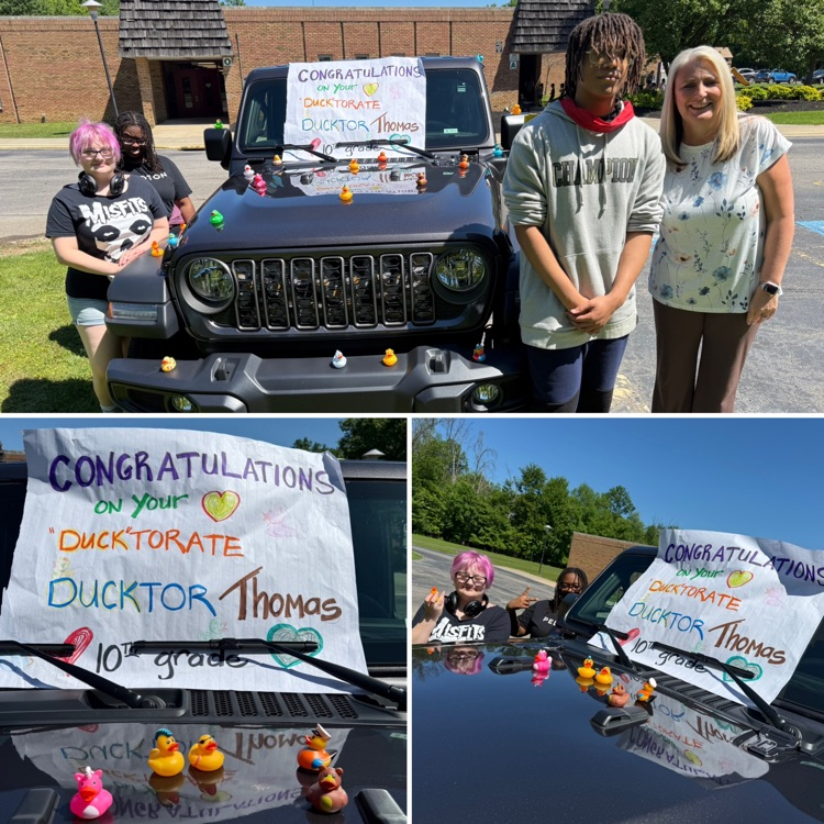 students outside with the Superintendent