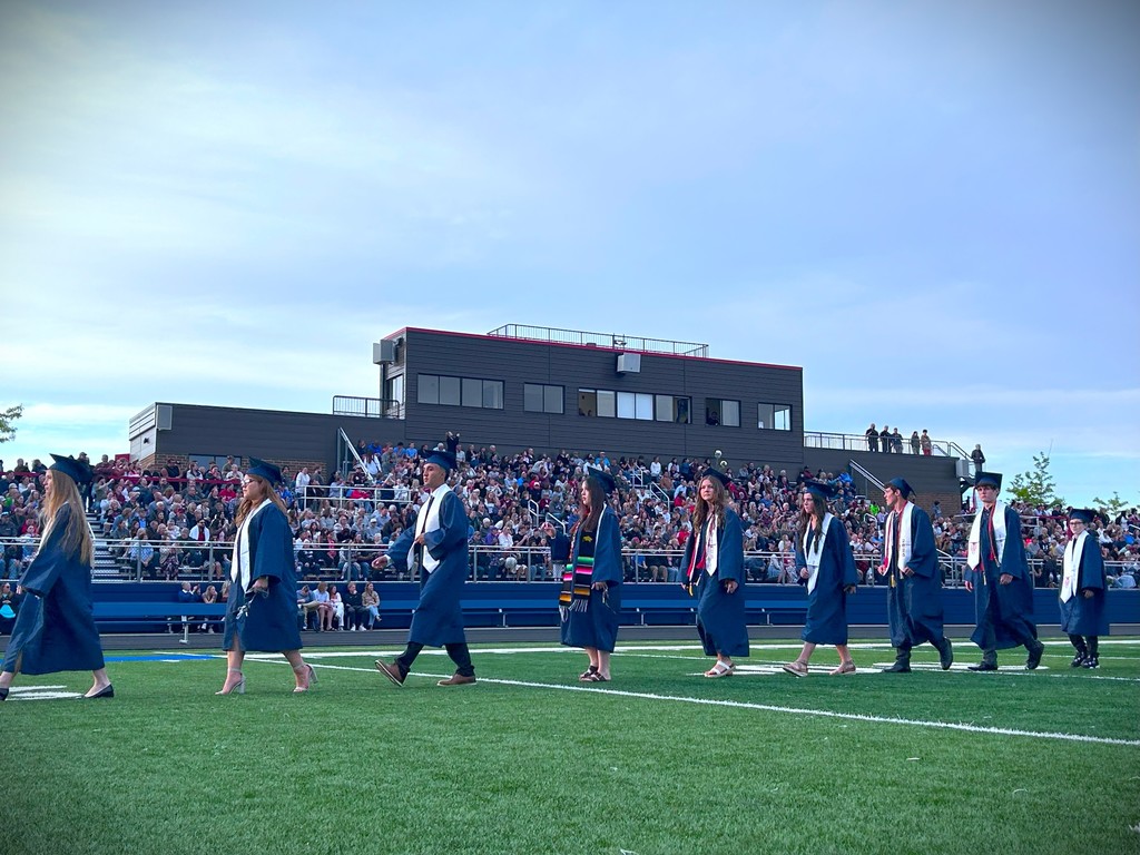 Graduates processing during commencement.