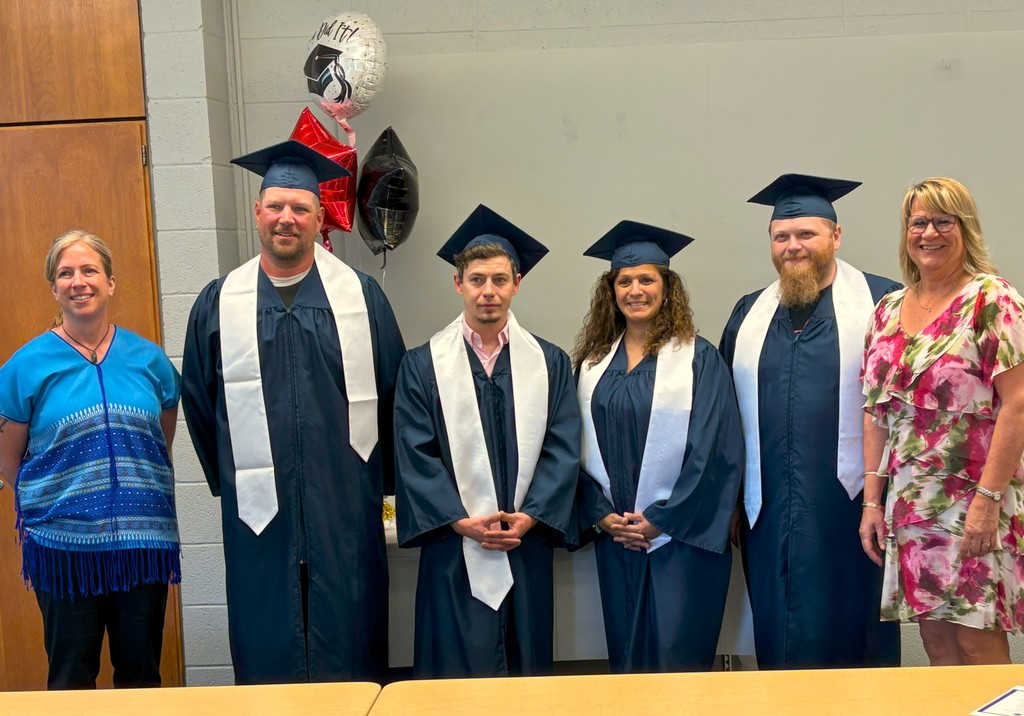 Adult Education Students and Staff pose for photos at the Adult Education Ceremony