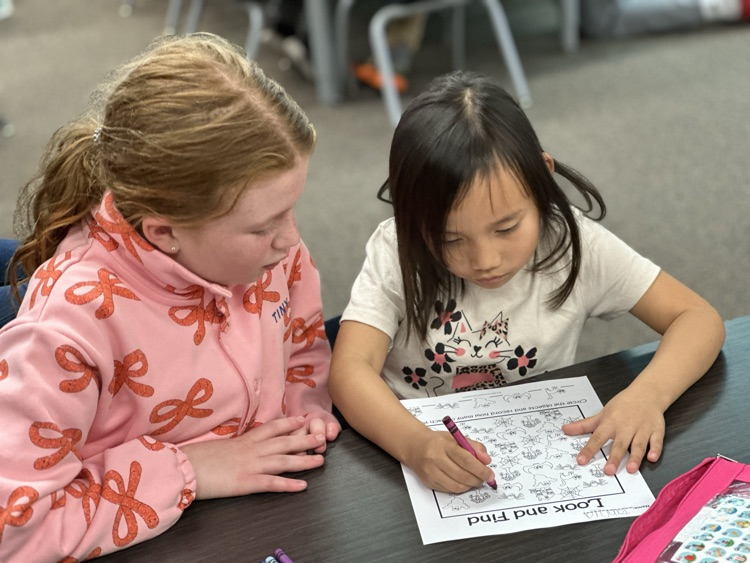 Kindergarteners and 5th grade buddies.