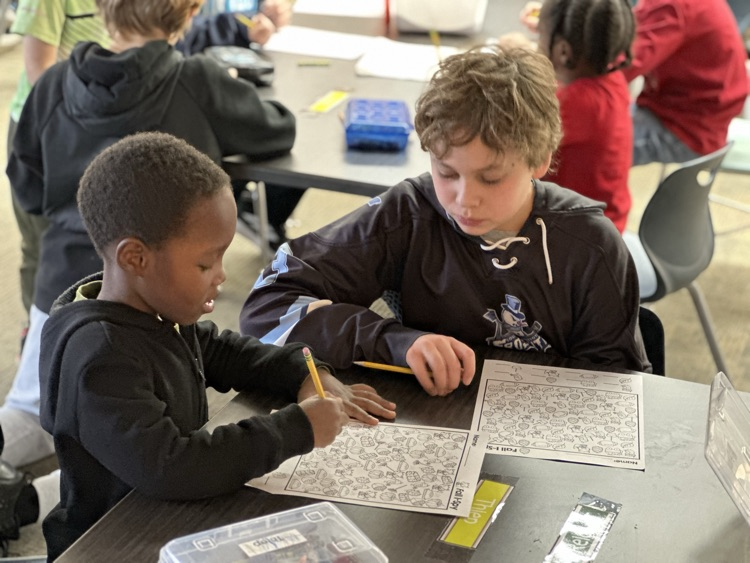 Kindergarteners and 5th grade buddies.