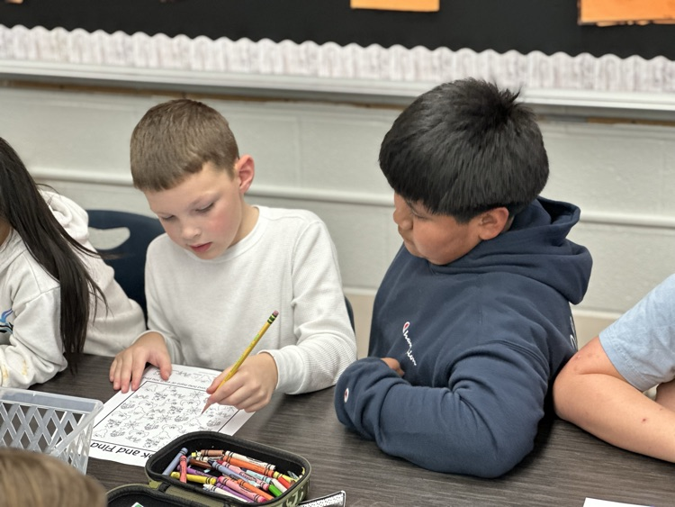 Kindergarteners and 5th grade buddies.