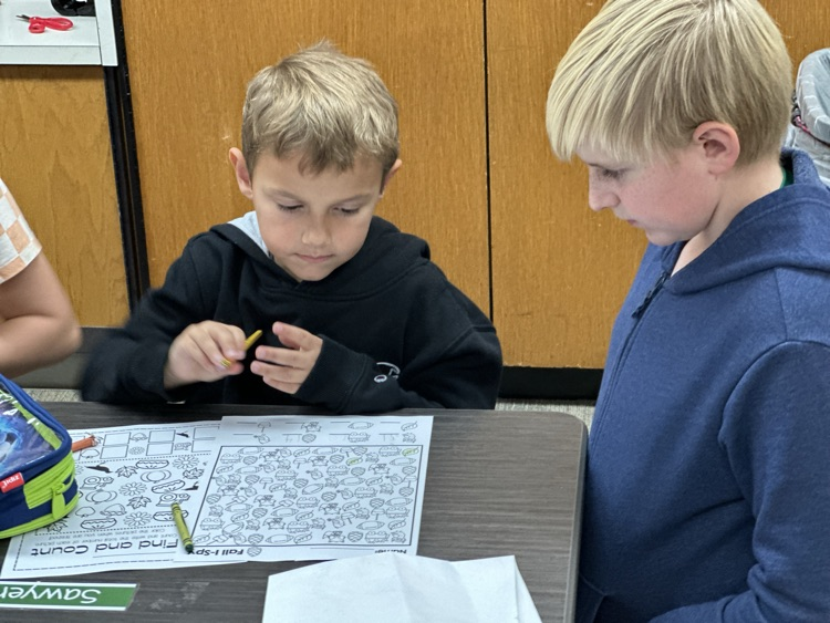 Kindergarteners and 5th grade buddies.