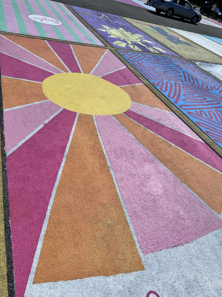 ALHS seniors painting their parking spaces. 