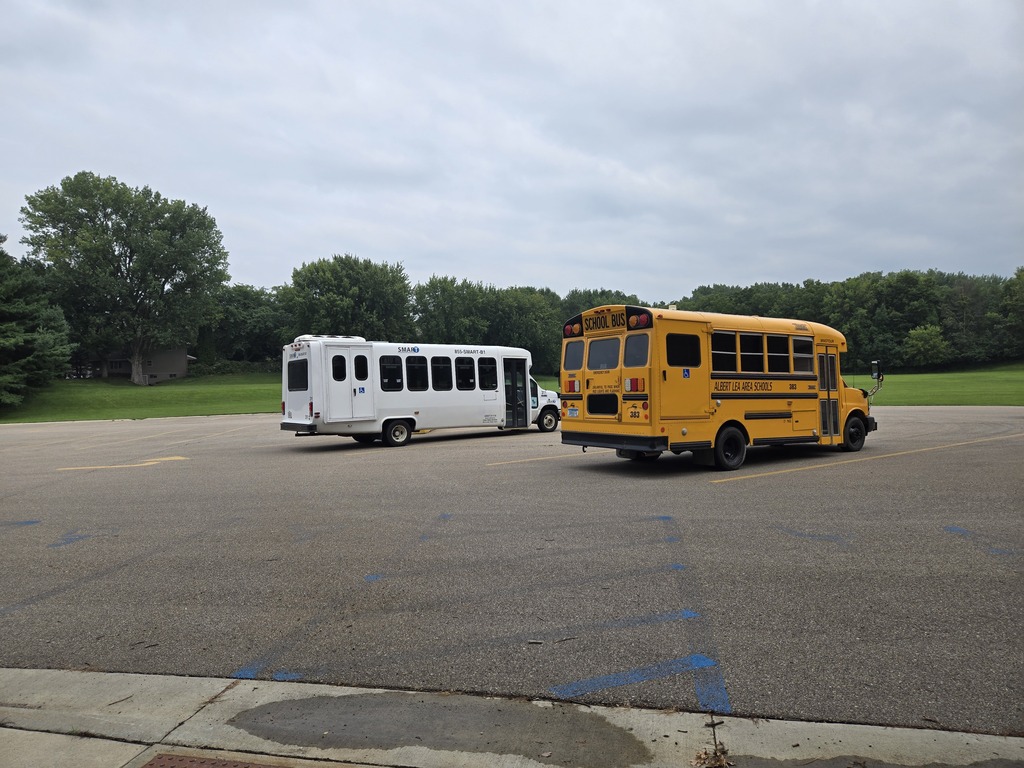 Picture of School Bus and SMART Transit Bus outside of Brookside