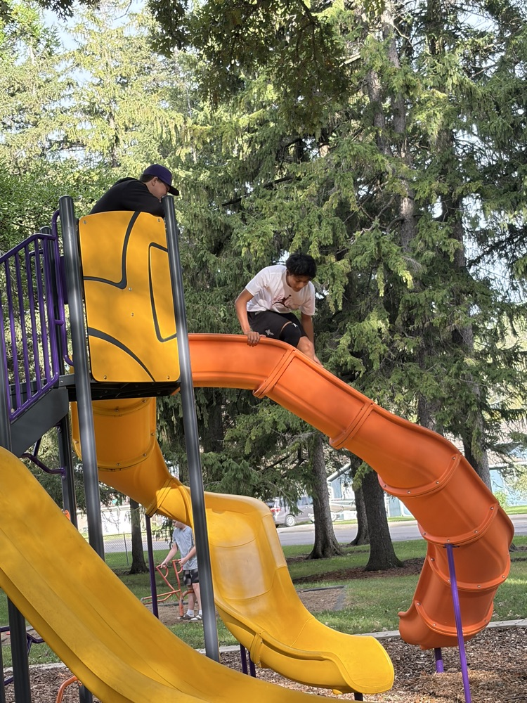 Students playing at the park.
