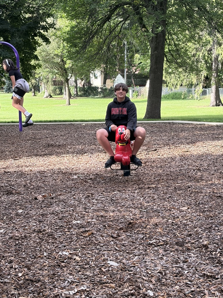 Students playing at the park.