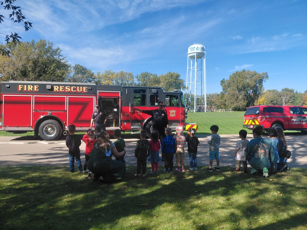 Students learning about the fire truck