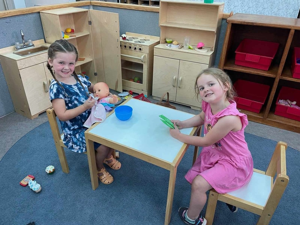 Early Learning students at a table