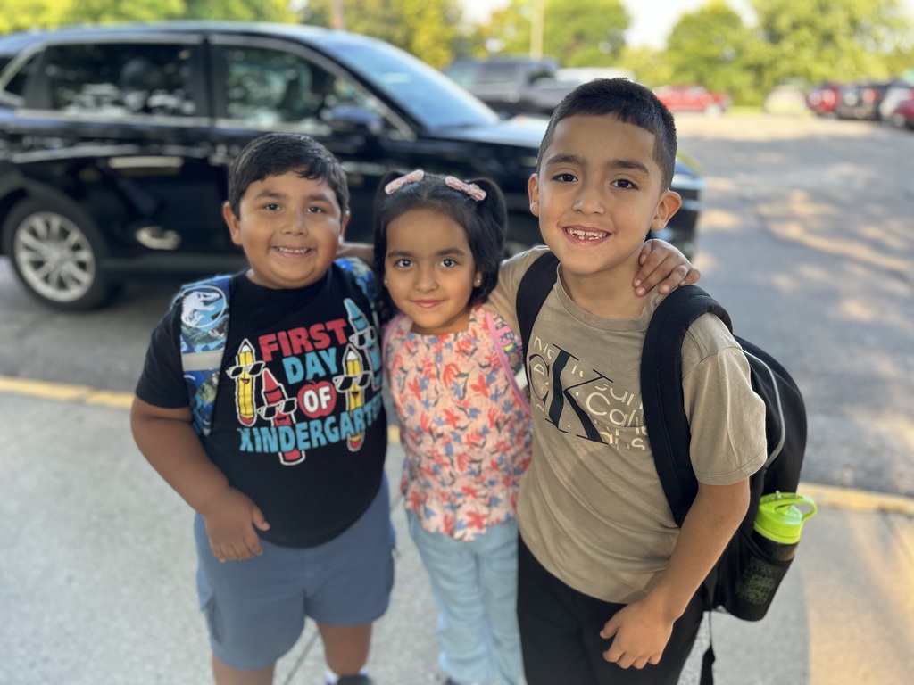 Students posing for 1st day of school photos