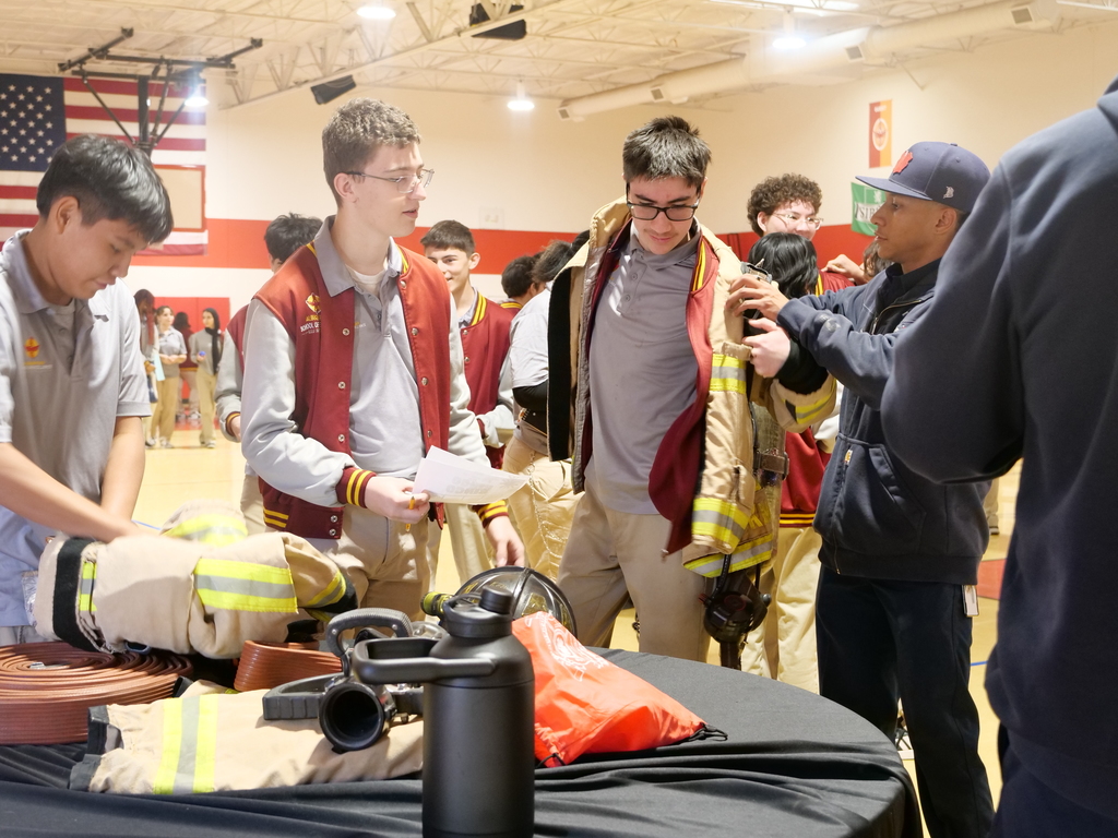 Student wearing firefighter uniform