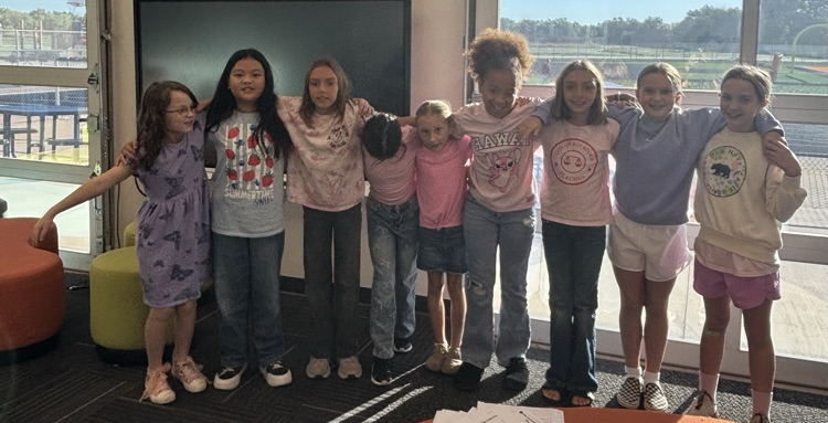 4th grade girls pose together